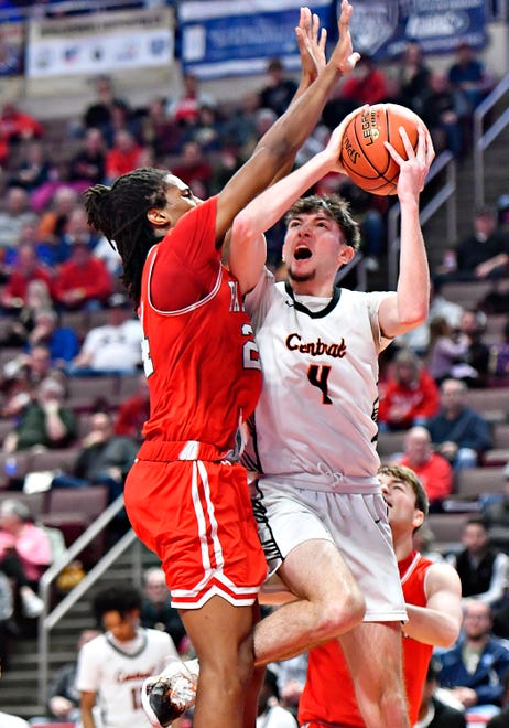 Central York’s Greg Guidinger, right, takes the ball to the basket while Parkland’s Zaire Smaltz defends during PIAA Class 6A boys’ basketball championship action at Giant Center in Hershey, Saturday, March 23, 2024. Central York would win the game 53-51. (Dawn J. Sagert/The York Dispatch)