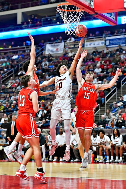 Central York’s Ryan Brown, center, takes the ball to the basket while Parkland defends during PIAA Class 6A boys’ basketball championship action at Giant Center in Hershey, Saturday, March 23, 2024. Central York would win the game 53-51. (Dawn J. Sagert/The York Dispatch)