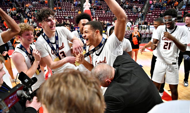 Central York celebrates a 53-51 win over Parkland during PIAA Class 6A boys’ basketball championship action at Giant Center in Hershey, Saturday, March 23, 2024. (Dawn J. Sagert/The York Dispatch)