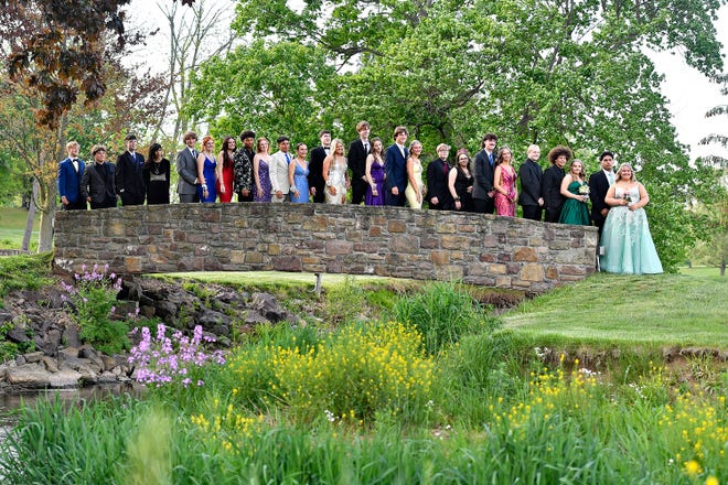 Students and their guests arrive for the Hanover High School prom at the Hanover Country Club in Paradise Township, Friday, May 3, 2024. (Dawn J. Sagert/The York Dispatch)
