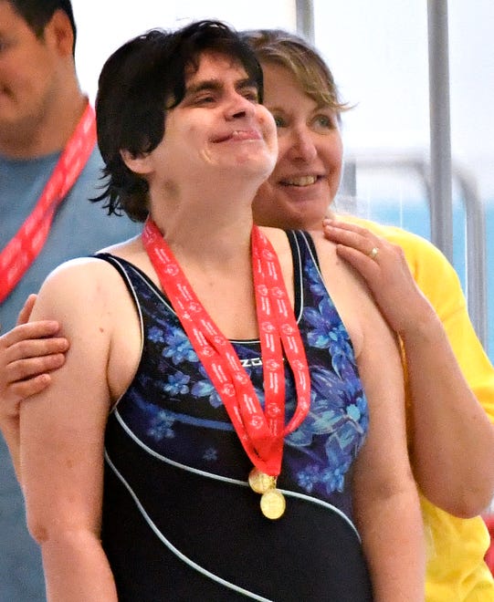 Athletes accept their awards during the Special Olympics Spring Games at Grumbacher Sport and Fitness Center on the York College of Pennsylvania Campus in Spring Garden Township, Saturday, May 4, 2024. (Dawn J. Sagert/The York Dispatch)