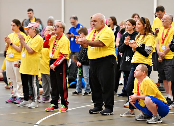 Athletes applaud each other as they accept their awards during the Special Olympics Spring Games at Grumbacher Sport and Fitness Center on the York College of Pennsylvania Campus in Spring Garden Township, Saturday, May 4, 2024. (Dawn J. Sagert/The York Dispatch)