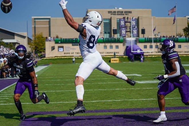 Penn State tight end Theo Johnson misses a pass from quarterback Drew Allar during the first half of an NCAA college football game against Northwestern, Saturday, Sept. 30, 2023, in Evanston, Ill. (AP Photo/Erin Hooley)