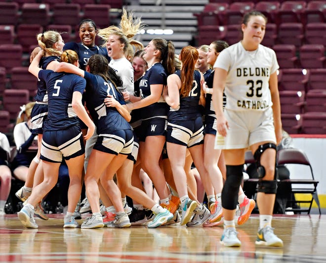 Wyomissing celebrates a 45-32 win over Delone Catholic during District 3, Class 4A girls’ basketball championship action at Giant Center in Hershey, Thursday, Feb. 29, 2024. (Dawn J. Sagert/The York Dispatch)