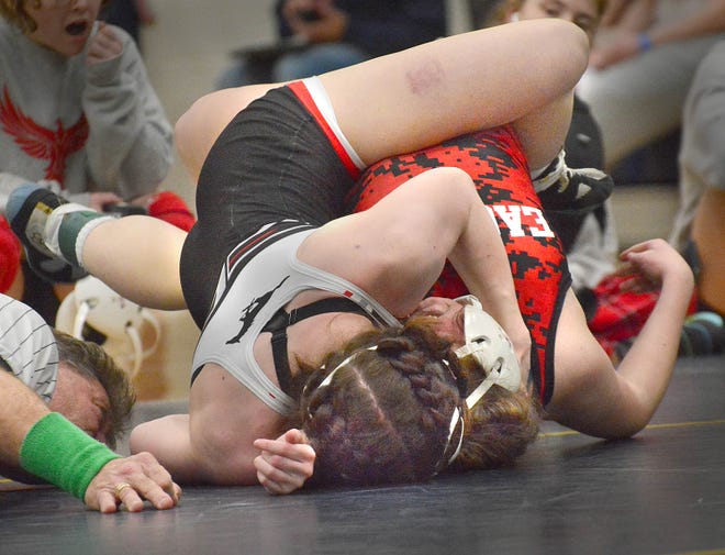 South Western's Miriam Westfort, front, pinned Emma Beaven of Cumberland Valley in the first round of the 155-pound class at the PIAA District 3 girls' wrestling tournament at Penn Manor High School in Millersville on Saturday, March 2, 2024.