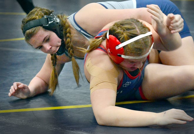 Avery Baldwin of Dallastown, left, pinned Livia Donley of Red Land at 2:35 in the 155-pound class at the PIAA District 3 girls' wrestling tournament at Penn Manor High School in Millersville on Saturday, March 2, 2024.