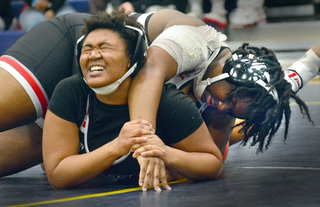 South Western's Kayla Henderson, right, won a 3-1 decision over McCaskey's Lauren Labrew in the 235-pound quarterfinals at the PIAA District 3 girls' wrestling tournament at Penn Manor High School in Millersville on Saturday, March 2, 2024.