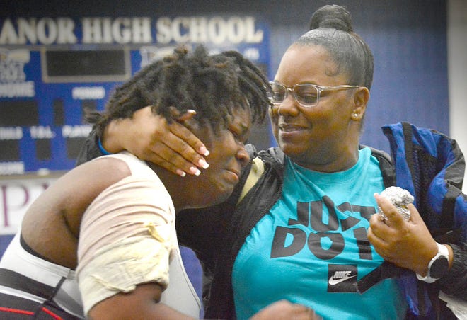 South Western's Kayla Henderson, left, gets a tearful hug from her mother, Andrea Henderson, after winning gold in the 235-pound weight class at the PIAA District 3 girls' wrestling tournament at Penn Manor High School in Millersville on Saturday, March 2, 2024.