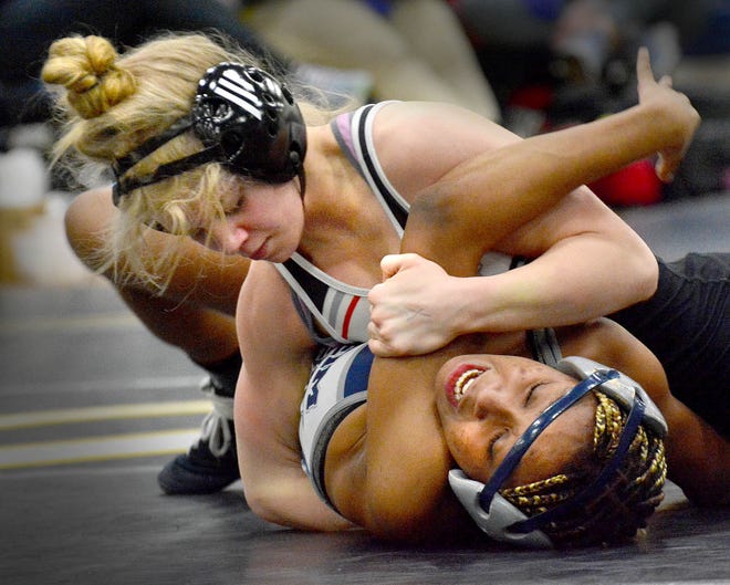 South Western's Natalie Handy, top, pinned Yenyia Terry of Manheim Township in the consolation semifinals at 106 pounds at the PIAA District 3 girls' wrestling tournament at Penn Manor High School in Millersville on Saturday, March 2, 2024.