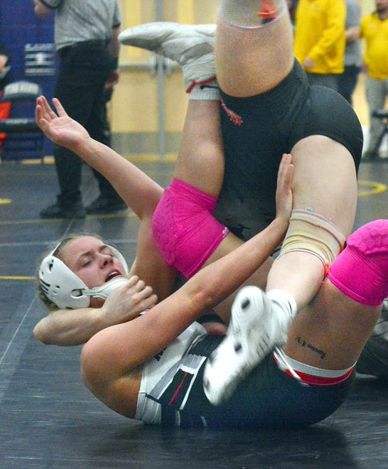 South Western's Tatum Duckworth, left, was pinned by Eliana White-Vega of Cumberland Valley in the 124-pound final at the PIAA District 3 girls' wrestling tournament at Penn Manor High School in Millersville on Saturday, March 2, 2024.