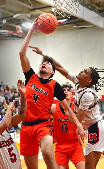 Central York's Greg Guidinger (4) lays the ball up against Reading during the PIAA Class 6A semifinals on Tuesday, March 19, 2024, at Warwick High School in Lilitz. The Panthers won, 79-65, and advanced to the state final for the first time in program history.