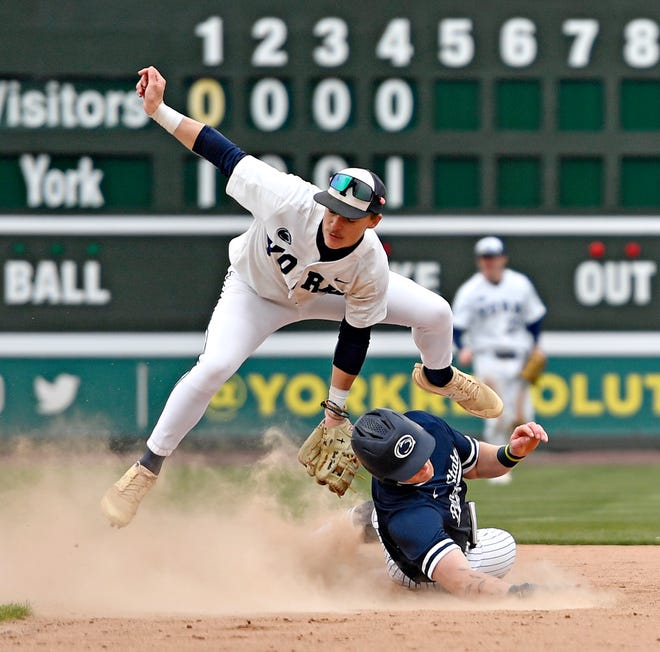 Penn State York’s Nate Fowler , top, tags out Penn State Scranton’s Guy Mushow at second during baseball action at WellSpan Park in York City, Friday, March 22, 2024. Penn State York would win the first game in the afternoon doubleheader 4-1. (Dawn J. Sagert/The York Dispatch)