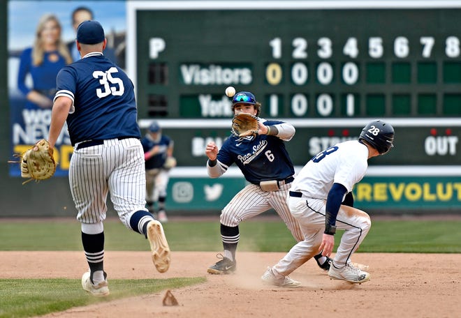 Penn State York’s Gavin Constein, right, gets caught in a rundown between Penn State Scranton’s Zach Benson, left, and Alex Pagotto, during baseball action at WellSpan Park in York City, Friday, March 22, 2024. Penn State York would win the first game in the afternoon doubleheader 4-1. (Dawn J. Sagert/The York Dispatch)