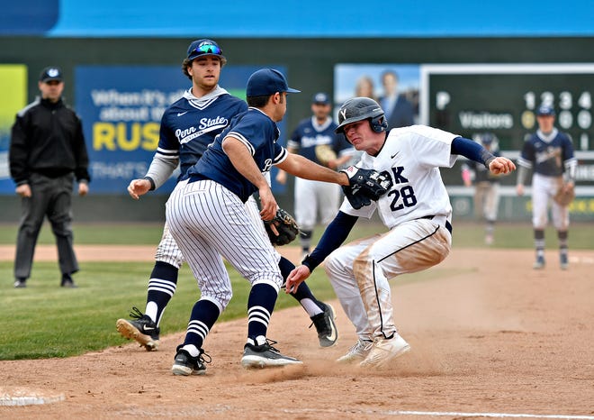 Penn State York’s Gavin Constein, front right, gets caught in a rundown between Penn State Scranton’s Zach Benson, front left, and Alex Pagotto, back left, during baseball action at WellSpan Park in York City, Friday, March 22, 2024. Penn State York would win the first game in the afternoon doubleheader 4-1. (Dawn J. Sagert/The York Dispatch)
