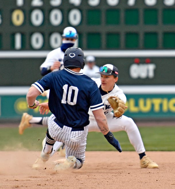 Penn State York’s Nate Fowler , right, tags out Penn State Scranton’s Guy Mushow at second during baseball action at WellSpan Park in York City, Friday, March 22, 2024. Penn State York would win the first game in the afternoon doubleheader 4-1. (Dawn J. Sagert/The York Dispatch)