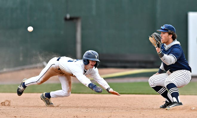 Penn State York’s Colin Eckinger, left, races the ball back to second before he’s tagged out by Penn State Scranton’s Alex Pagotto during baseball action at WellSpan Park in York City, Friday, March 22, 2024. Penn State York would win the first game in the afternoon doubleheader 4-1. (Dawn J. Sagert/The York Dispatch)
