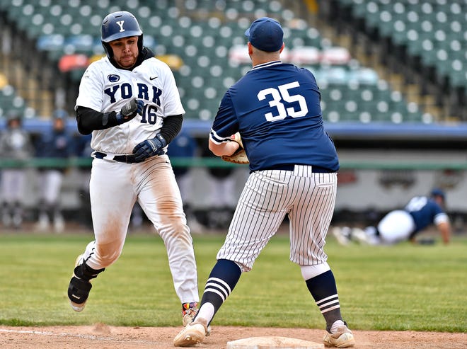 Penn State York’s Mike Newsome, left, avoids Penn State Scranton’s Zach Benson during baseball action at WellSpan Park in York City, Friday, March 22, 2024. Penn State York would win the first game in the afternoon doubleheader 4-1. (Dawn J. Sagert/The York Dispatch)