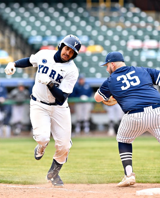 Penn State York’s Sam Richie, left, avoids Penn State Scranton’s Zach Benson during baseball action at WellSpan Park in York City, Friday, March 22, 2024. Penn State York would win the first game in the afternoon doubleheader 4-1. (Dawn J. Sagert/The York Dispatch)