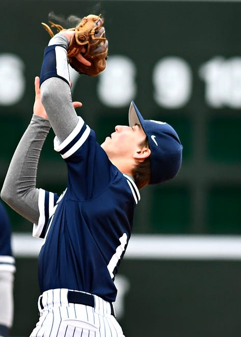 Penn State Scranton’s Tyler Kopec, front, catches the ball for an out during baseball action against Penn State York at WellSpan Park in York City, Friday, March 22, 2024. Penn State York would win the first game in the afternoon doubleheader 4-1. (Dawn J. Sagert/The York Dispatch)