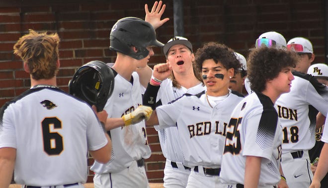 Red Lion baseball players celebrate during a York-Adams Division I game against Northeastern on Wednesday, April 10, 2024, at Red Lion High School. The Lions rallied from a slow start to win, 7-2.