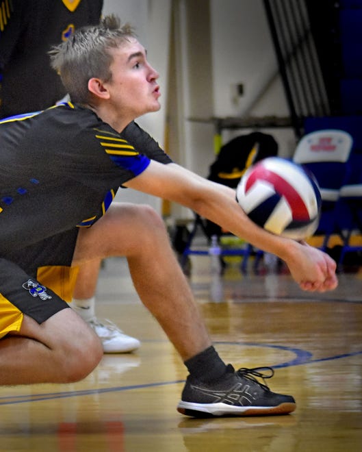 Kennard-Dale's Connor Milton digs the ball against New Oxford during York-Adams League boys' volleyball action Thursday, April 11, 2024, at New Oxford. The Colonials swept the Rams, 3-0.