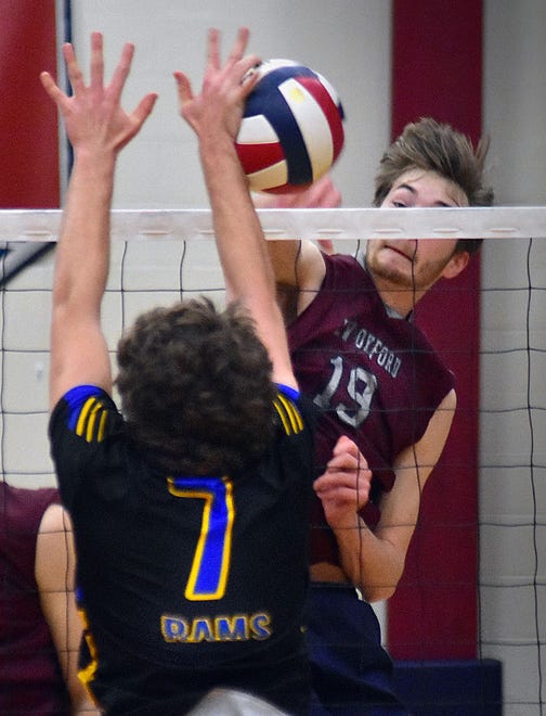 New Oxford's Jackson Wolfe (19) against Kennard-Dale's Nicholas Gaumer (7) during York-Adams League boys' volleyball action Thursday, April 11, 2024, at New Oxford. The Colonials swept the Rams, 3-0.