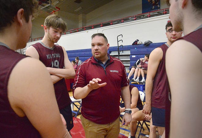 New Oxford head coach Brandon Dinges speaks to his players during a timeout against Kennard-Dale in boys' volleyball action Thursday, April 11, 2024, at New Oxford. The host Colonials swept the Rams, 3-0.
