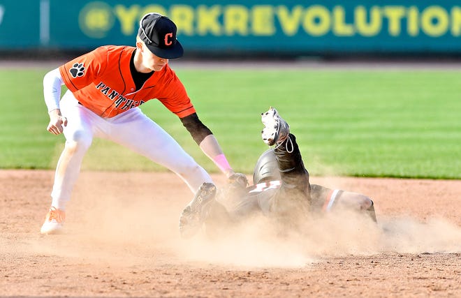 Central York’s Eric Rebert, left, tags South Western’s Landen Eyster out at second during the Crushing Cancer baseball fundraising event at WellSpan Park in York City, Friday, April 12, 2024. South Western would win the game 7-2. (Dawn J. Sagert/The York Dispatch)