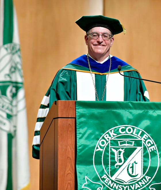 York College of Pennsylvania President Dr. Thomas D. Burns takes the podium during his inauguration ceremony at the Waldner Performing Arts Center in the York College of Pennsylvania campus in Spring Garden Township, Saturday, April 13, 2024. (Dawn J. Sagert/The York Dispatch)