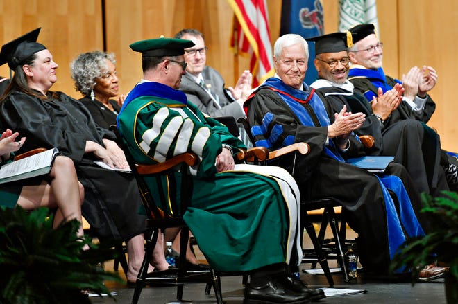 Applause is offered during the inauguration ceremony is held for the college’s fifth president, Dr. Thomas D. Burns, at the Waldner Performing Arts Center in the York College of Pennsylvania campus in Spring Garden Township, Saturday, April 13, 2024. (Dawn J. Sagert/The York Dispatch)