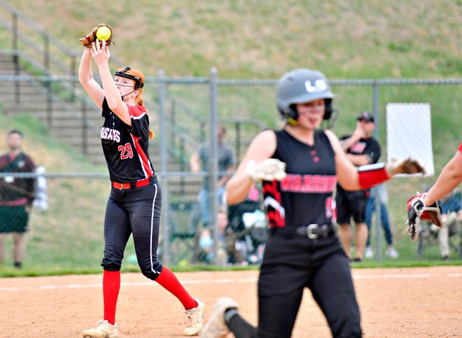 South Western’s Jayda Koontz, back, catches the ball for an out as Susquehannock’s Callie Shue runs to first during softball action at Susquehannock High School in Shrewsbury Township, Wednesday, April 17, 2024. South Western would win the game 8-0. (Dawn J. Sagert/The York Dispatch)