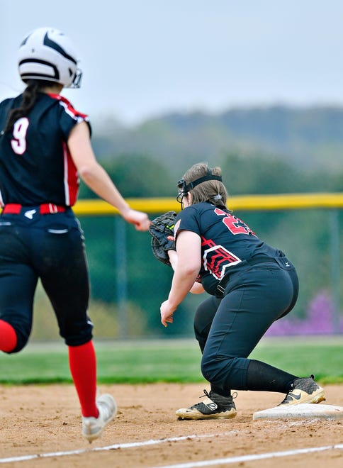 Susquehannock’s Kara Paterniti catches the ball at first to out South Western’s Remi Yates during softball action at Susquehannock High School in Shrewsbury Township, Wednesday, April 17, 2024. South Western would win the game 8-0. (Dawn J. Sagert/The York Dispatch)