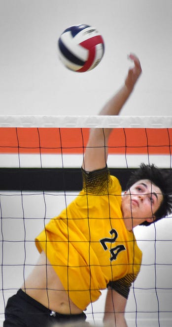 Red Lion's Jake Shaffer returns the ball against York Suburban during York-Adams League boys' volleyball action Wednesday, April 17, 2024, at York Suburban High School. The visiting Lions earned a 3-0 sweep of the Trojans.