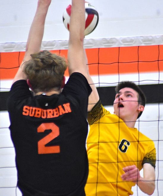 Red Lion's Blake Downs (6) goes against York Suburban's Trent Weinstein (2) during York-Adams League boys' volleyball action Wednesday, April 17, 2024, at York Suburban High School. The visiting Lions earned a 3-0 sweep of the Trojans.
