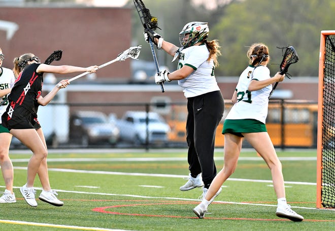 York Catholic’s Amanda Reed blocks a shot on goal by Susquehannock during girls’ lacrosse action at York Catholic High School in York City, Thursday, April 18, 2024. York Catholic would win the game 8-4. (Dawn J. Sagert/The York Dispatch)