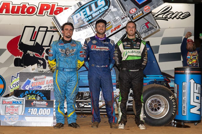 Hanover's Jacob Allen, center, is shown after winning the World of Outlaws race at Lincoln Speedway on Wednesday. He is flanked by Justin Peck, left, and Carson Macedo, right.