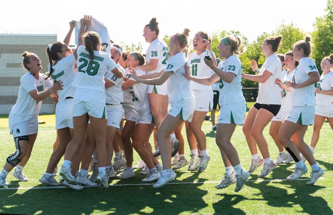 York College celebrating their win against Messiah during the Commonwealth Women's Lacrosse Final in York on Saturday, May 6, 2023.